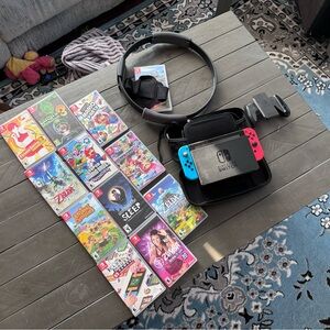 Nintendo Switch and all games seen in photo. Case and accessories for the Ring